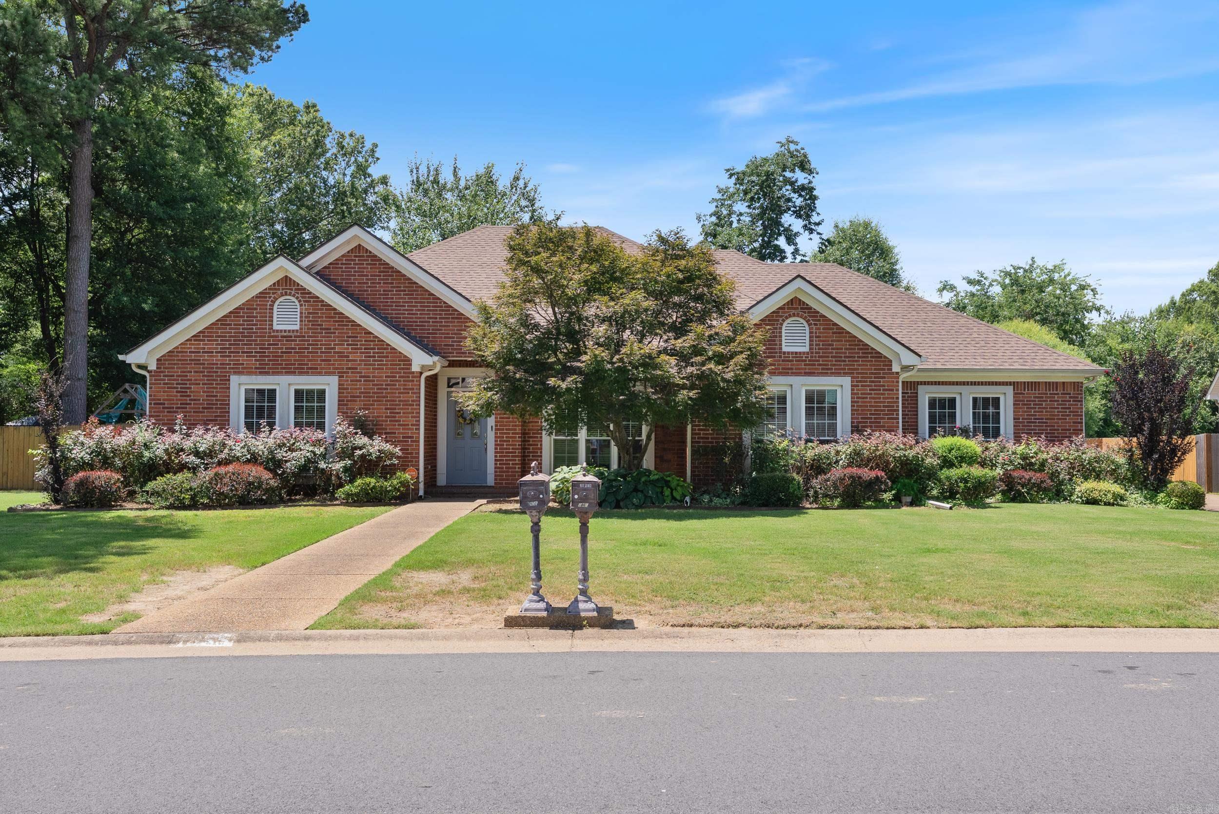 Welcome home to this one-level, all brick, 4 bedroom, 2 bathroom home in Conwayās desirable Pine Creek neighborhood! This spacious 2,205 sqft home features a split floorplan, hardwood floors, soaring 10 ft & 12 ft ceilings throughout. The chefās kitchen has tons of cabinets & counter space. The primary suite is a relaxing retreat with an updated bathroom, jacuzzi tub, and two walk-in closest. The large fenced backyard is itās own oasis with a pergola and fruit trees. Updates include: NEW roof (2024), some FRESH interior paint (2023), NEW granite, NEW tile showers & NEW tile flooring in bathrooms (2019), NEW tankless water heater (2023), NEW pergola (2019). Playset and trampoline included! Conway Corp utilities and convenient location close to everything you need. Itās a must see! Agents see remarks.