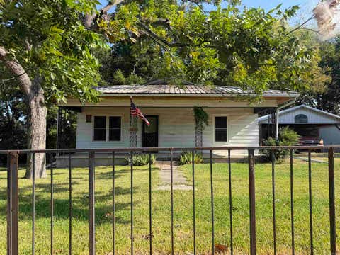 Photo of 214 E Walnut Street, De Valls Bluff, AR 72041 (MLS # 26033934)