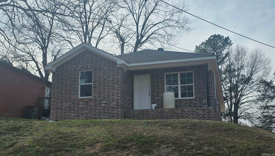 ALL BRICK HOME ITH QUARTZ COUNTER TOPS AND CARPORT RENTED $1500 A MO FOR 3 YR.