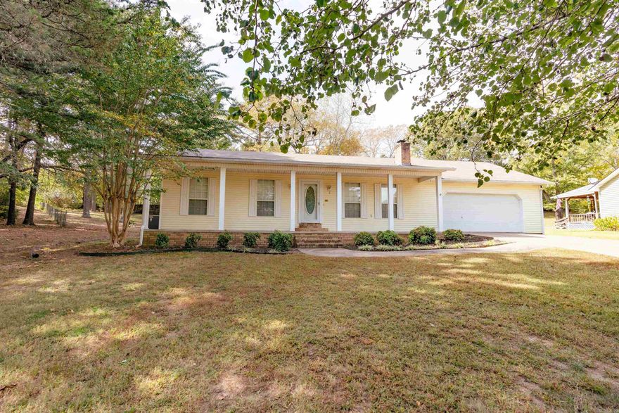 Hidden away in a cul-de-sac but convenient to everything, this home has had lots of improvements and updates since Seller purchased.  New 16 x 20 metal shop has electricity, insulation, and overhead door.  Home has new luxury vinyl wood floors through out, gas range & microwave new in 2020, dishwasher new 9/23, crown molding and windows trimmed out in some rooms, new subway tile backsplash in kitchen,Gas HVAC new in 2021.  Wood Burning Fireplace has a new gas log insert that is vented through roof and a new mantel, fully fenced back yard, french drain installed, and attic insulated to code.  Do you like fresh eggs?  There is the cutest chicken coop nestled in the corner of the back yard that was made for 6 chickens.   Call today for an appointment.