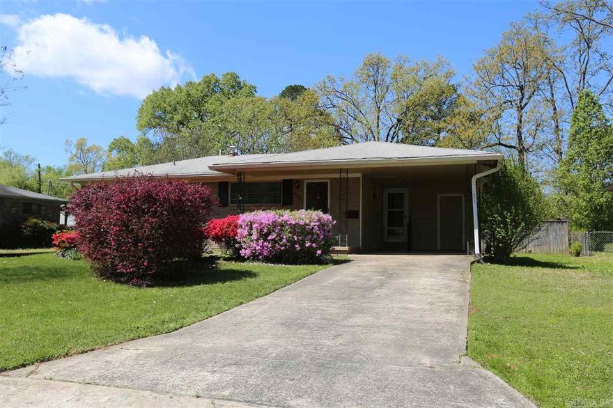 Great central location and in nice neighborhood for this 2 bedroom, 2 bath home with large living room plus a den with gas log fireplace. Insulated windows. Wonderful fenced backyard with deck and Large storage building. Sunroom. Quiet street. Easy to show. Repairs in progress.