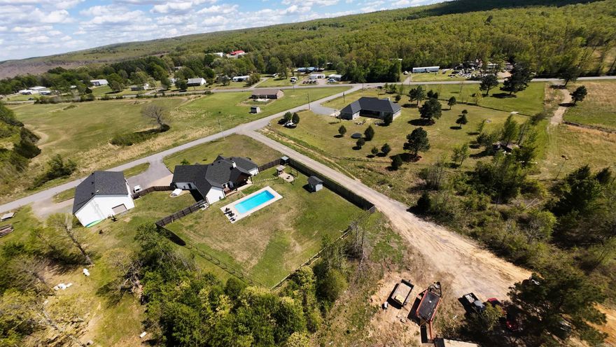 Well sized piece of property that is 7.68 acres to build your dream home. There is a minimum of 1400 square foot build. There is a dedicated easement to the property which has been leveled and graveled. Easement is clearly visible between two nice homes, land is behind one of the homes. Already two cleared spots for a future build with one being perc test approved. Call and ask for a showing. Builder can build to suit as well!