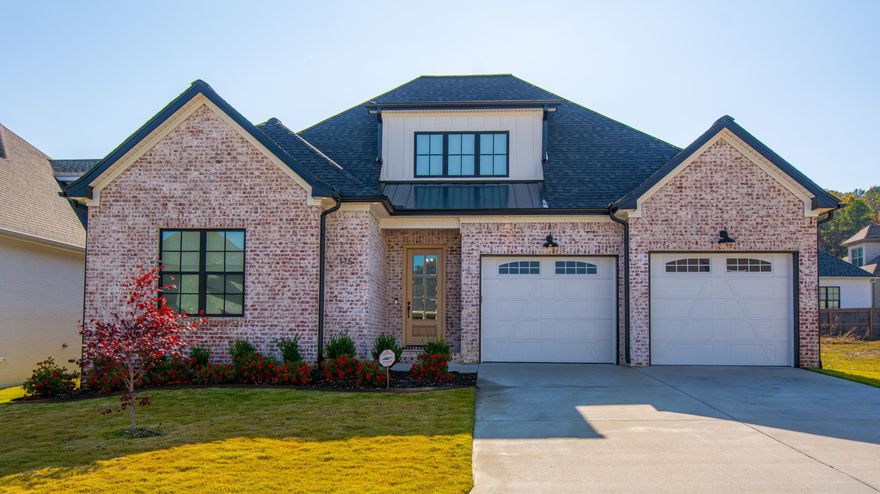 Beautiful home in highly sought after neighborhood. Open floor plan. 4 Bedrooms. Primary suite down with sitting area, vaulted tray ceiling with indirect lighting, large walk in closet, large walk in shower with large soaking / whirlpool bathtub. Jack and Jill bedroom and bathroom down. Powder room off foyer. Hardwood flooring in living areas. Carpet in bedrooms. Laundry accessible from primary suite. Beautiful brick accent wall in dining room. Double garage. Two fireplaces - gas log inside and wood burning outside under covered porch.