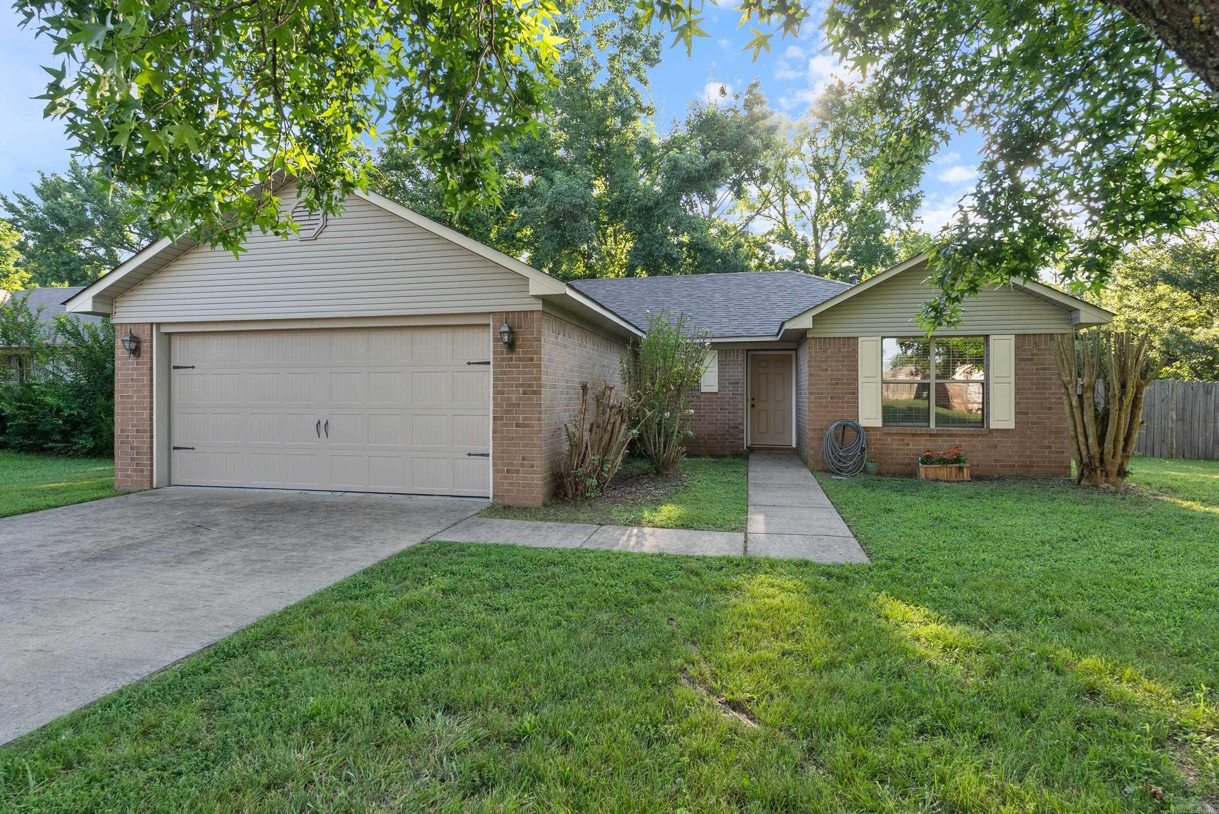 ***Back On Market. No Fault of Sellers.***Welcome home to this beautifully maintained 3 bedroom, 2 bathroom home featuring a desirable open, split floor plan and a long list of updates! Enjoy peace of mind with a NEW roof (May 2025) with premium architectural shingles, NEW LVP flooring in the living room, guest bath & laundry, plus fresh paint on ceilings & baseboards. The chef’s kitchen offers a NEW stainless steel refrigerator (2024), NEW microwave (2024), and NEW cabinet over the stove. Other perks include a NEW water heater, NEW garage door (2025), and a washer & dryer that’s only 3 yrs old. Relax on the oversized concrete patio overlooking a tranquil wooded area—perfect for morning coffee or evening gatherings. Kitchen refrigerator, washer & dryer,garage deep freezer and Conway Corp utilities included! This charming home has been professionally cleaned and is move-in ready! It’s also convenient to EVERYTHING including UCA, shopping, dining, and features reliable Conway Corp utilities. Won’t last long—schedule your tour today! Agents see remarks.