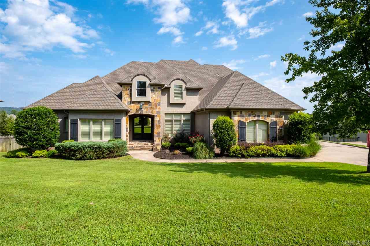 Stunning European style home with grand foyer that opens to the formal dining room. The living area encompasses a wall of windows. Gourmet kitchen with 5 burner gas cook top and double convection ovens. Master suite and guest located on the main level. Spa like master bath with double shower. This home has all the extras: great bonus room, office & exercise room, 3 car garage.