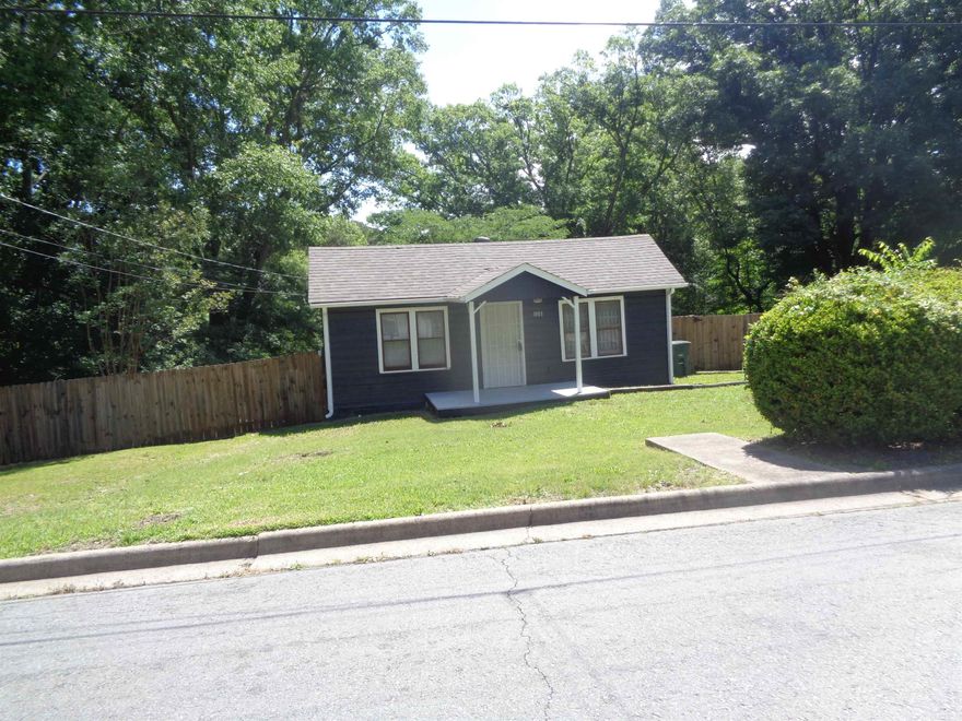 A very cute home with 3 bedrooms and 2 full baths sitting on three (3) large lots in a park like setting. The recent exterior painting makes this house POP! and the spacious separate private master bedroom suite with the large walk-in closet is so nice. With almost an 1/2 acre of land, multiple storage areas including a huge "Tuff Shed" storage building, an updated roof, a new sewer line, tankless water heater and updated electrical system makes this property special. The gas cook range and refrigerator convey in "As In" condition. This is priced for "First Time Buyers" and investors ready to add to their portfolio. Agents please check remarks section.