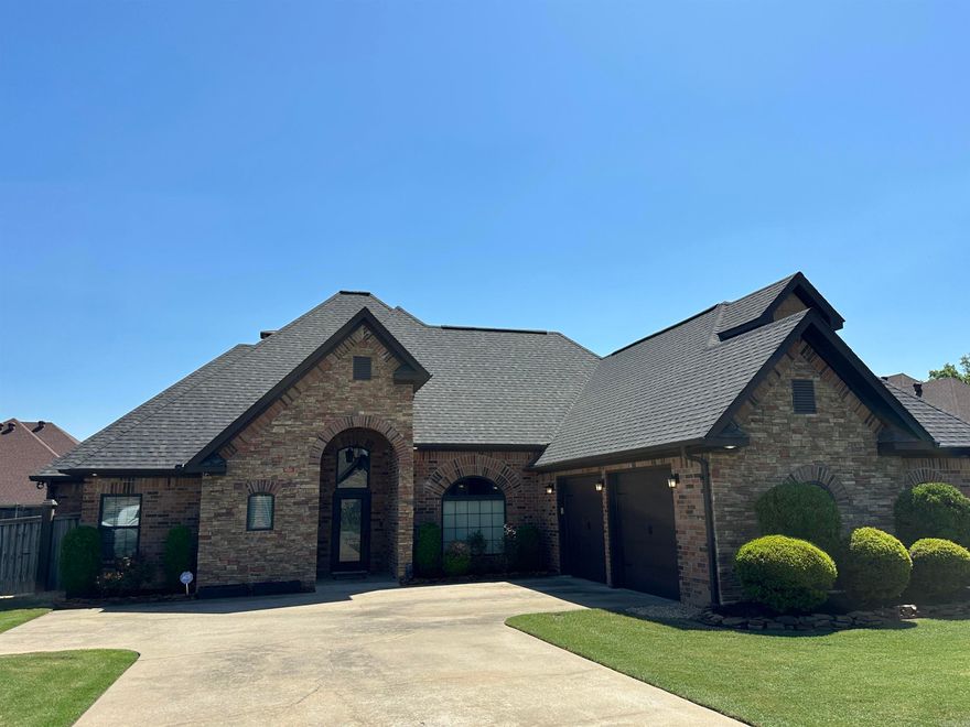 Experience this custom stone and brick home that sits grandly in a secluded cul-de-sac in one of the most convenient locations in town.  The architecture of this home is a show stopper and the quality and condition are like new throughout.  Tall ceilings greet you as you enter the large open concept living area with wood burning fireplace offering a great place to entertain friends and family.  The kitchen bar with seating for 6 is a great place to visit with the chef of the home as they cook up great meals and memories in this large kitchen.  Step out to your  covered patio to enjoy the BBQ and a large lawn with room for fun in the sun, your own herb garden and a nicely appointed storage/garden shed with room for any hobbiest to dream big!  The split bedroom plan offers three rooms and one full bathroom on one side of the home.  Step into the large master suite, with its own outdoor patio on the opposite side of the home and a en-suite with heated tile floors, walk in shower and soaker tub await!    The homes extended 2 car garage includes a built in storm shelter.   Updates include a new roof, HVAC, Hot Water Heaters, Modern Kitchen and all new bathrooms throughout!