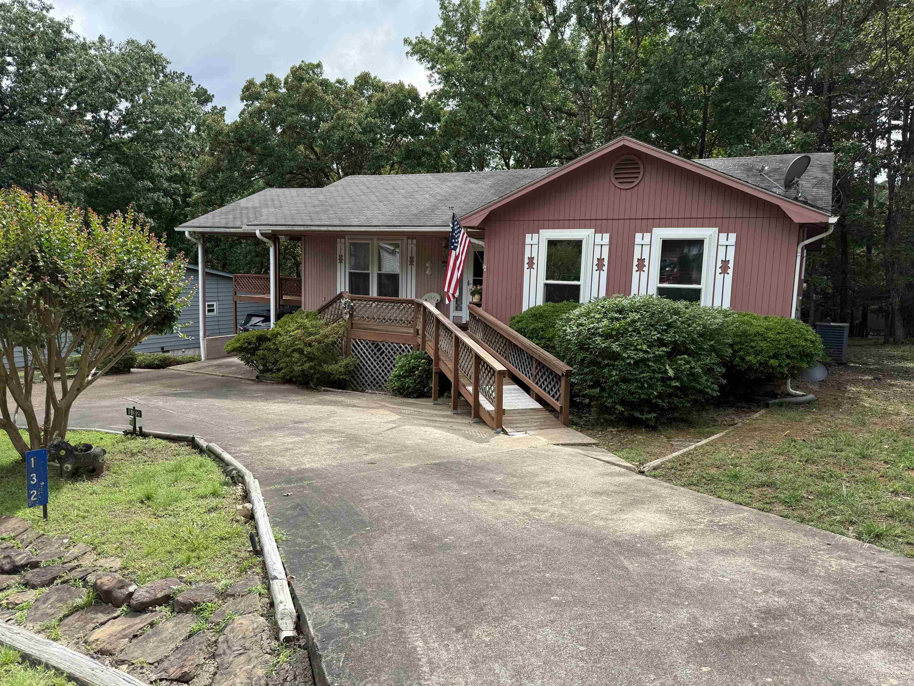 Welcome to this 4 bedroom, 2 bath home offering 1,816 sq ft of living space in the desirable lake community of Fairfield Bay near Greers Ferry Lake. This property features a 1-car carport, convenient circle drive, and a spacious layout perfect for full-time living or a weekend retreat. The basement includes a workshop with outside access only, along with additional storage space. Fairfield Bay offers golf, pools, mini golf, hiking and biking trails, 90+ miles of ATV trails, and the top-rated Fairfield Bay Marina on Greers Ferry Lake. Great opportunity to live near the lake!
