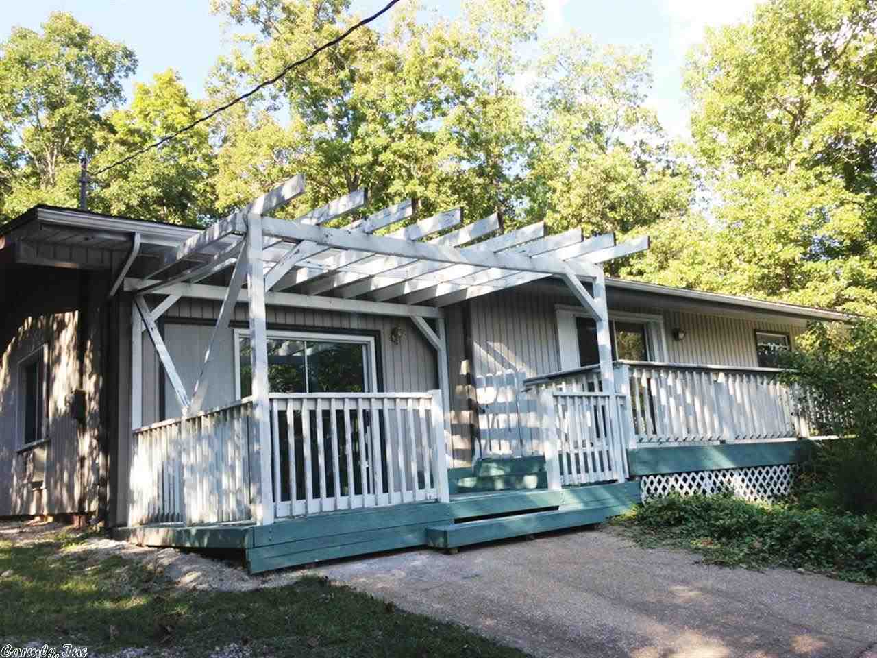 CLOSE TO LAKE THUNDERBIRD, T-BIRD REC CENTER, & walking trails!!! How about 3 bedrooms, 2 baths, approx 1920 sq ft with replaced roof & septic tank-per owner, wood burning fireplace with insert. Central h/a, 2nd fireplace, gas stove, dishwasher, disposal, cedar closets, built in book shelves, garden house in great back yard, storage building, small fenced area for pet- So much for your money. Needs a bit of finishing here and there but with this much sq ft and this great location you should take a look!..