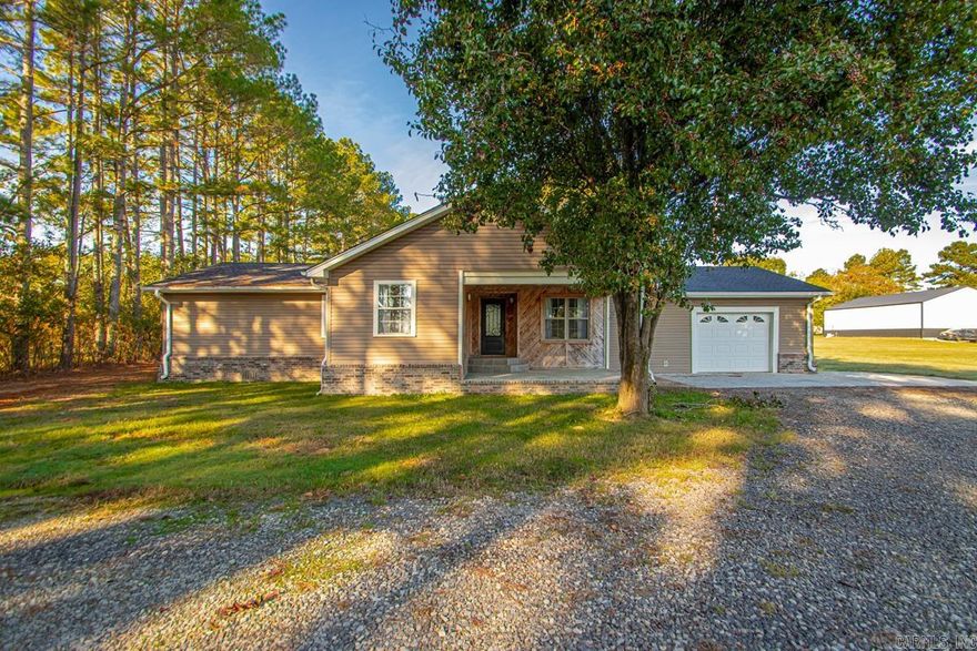 Welcome to 3426 Hwy 5 in El Paso, AR—a beautifully updated 3 bed, 2 bath home on just over an acre. Features include new floors and fresh paint in all three bedrooms, a spacious living area, three-car garage, and a 30x40 shop with electric, perfect for storage, hobbies, or a workspace. Recent updates: new roof and septic lines (2024), new AC unit (2021), and 70-gallon water heater (2020). Move-in ready with room to spread out and enjoy country living with modern upgrades.