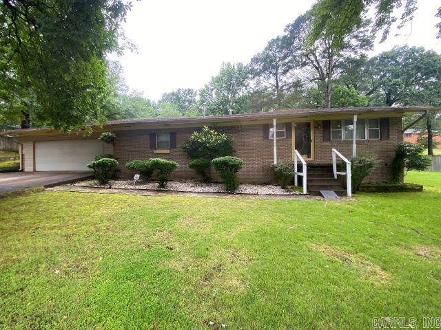 Enjoy country quietness in the city. Close to interstate access and city parks. This three bedroom, two bathroom home sits on a spacious lot. It has a formal living room and a large family room with a fireplace. Lots of storage is a plus for this house, including a storage building out back. The roof was replaced about 5-8 years ago and the house has been carefully maintained throughout the years. The property is to be sold "as-is."