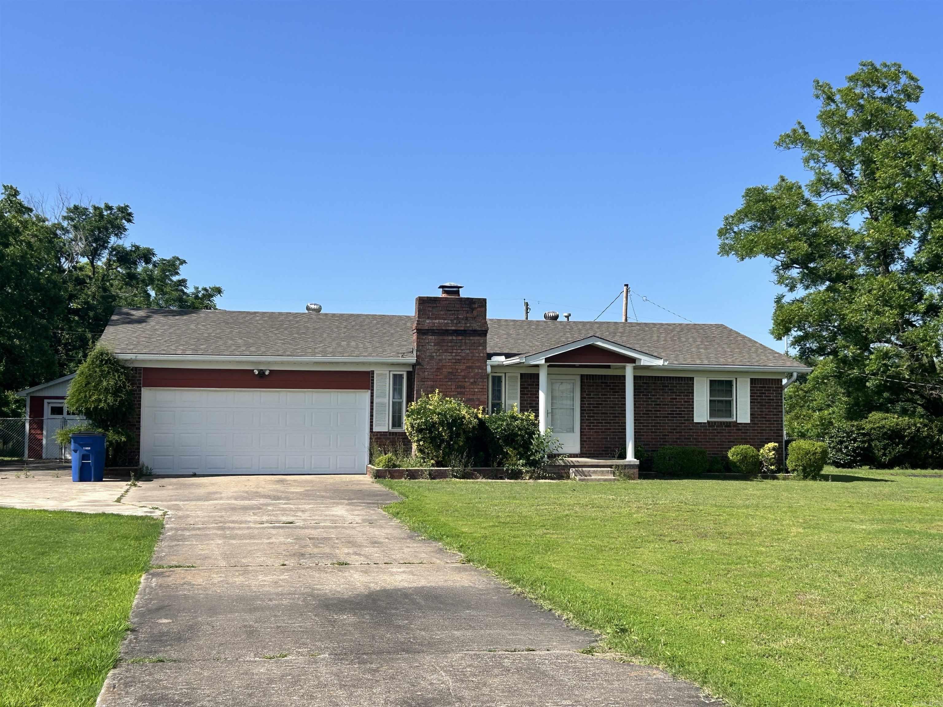 Investor special! 2 Bed, 2 Bath with a bonus room. 2 Shops in the backyard will convey. Being sold AS-IS WHERE IS