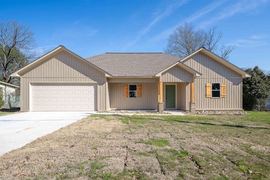 Newly constructed home ready for its first owner! This modern residence features an open layout with plenty of natural light, a sleek kitchen with modern appliances, and spacious living areas. It includes 3 bedrooms and 2 bathrooms, perfect for comfort and convenience. Located close to town, you'll enjoy easy access to shopping, dining, and schools. A great opportunity to make this beautiful home yours!