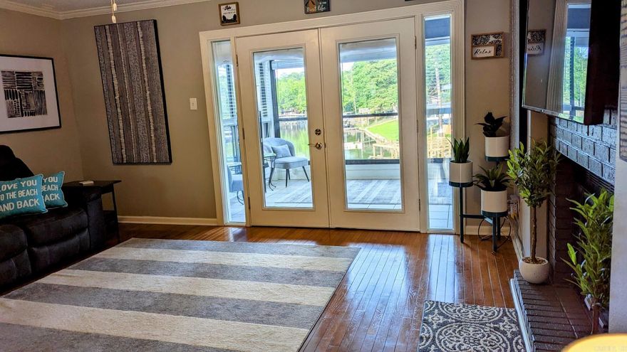 Located in Westport Bay less than a minute from the MLK Bypass. This updated, fully furnished condo with a comfortable stylish interior could be your Lake Hamilton getaway for fun weekends or for comfortable full time living. The glassed in patio provides extra living space and is heated and cooled.  The living and dining areas are spacious and well designed. The fireplace completes the ambiance. The master bedroom has a large ensuite bathroom and there are double walk in closets. The updated large kitchen has all the expected amenities and there is a handy coffee bar which could be a wine bar closer to the living area. The large hall bathroom and second bedroom complete the condo. Current owners have a large family and extra sleeping areas accommodated their family just fine. These condos are located just off the main channel and the owners covered boat stall doesn't get the main channel wave action. There's also a swim dock and two outdoor gathering areas as part of the common ground amenities. Park your car in the assigned covered carport and note that there is plenty of guest parking spots available as well.