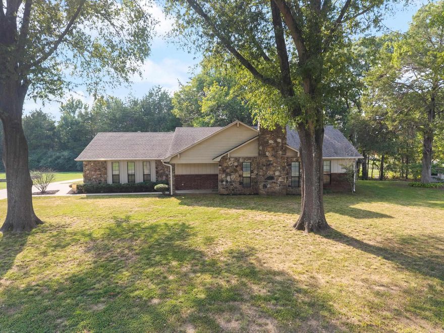 Welcome home to this spacious West Conway beauty that truly has it all! Step inside to a large living area centered around a stunning stone fireplace, perfect for cozy evenings. The home features a generous dining room, a large functional kitchen, and a large laundry room with a convenient half bath. The oversized primary suite includes a huge walk-in closet with custom built-ins, while the additional bedrooms offer deep closets with built-ins for extra storage. Enjoy outdoor living on the shaded patio overlooking the mature tree-lined lot that helps keep utility costs low. Need workspace or storage? The property includes a fantastic shopāfully insulated, equipped with electricity, a mini split, and a double carport ideal for your boat, trailer, or extra vehicles. With a side-entry garage and thoughtful details throughout, this home combines comfort, function, and value in one perfect package. You must see this beauty in person!