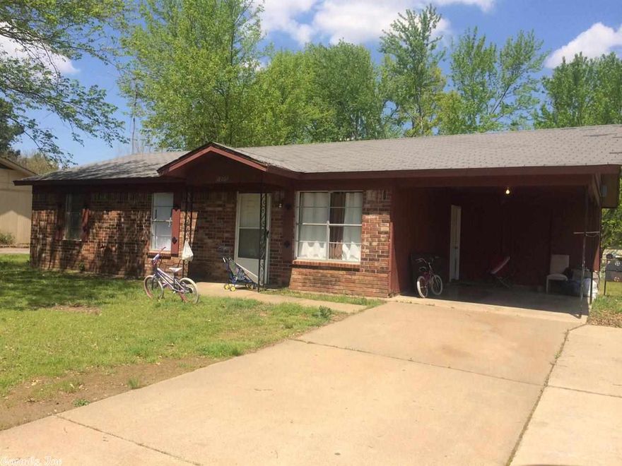 NICE AFFORDABLE 3 BEDROOM HOME!!! Under $69,000 this 3 bedroom, 1.5 bath, brick home, family friendly yard, carport and extra parking.