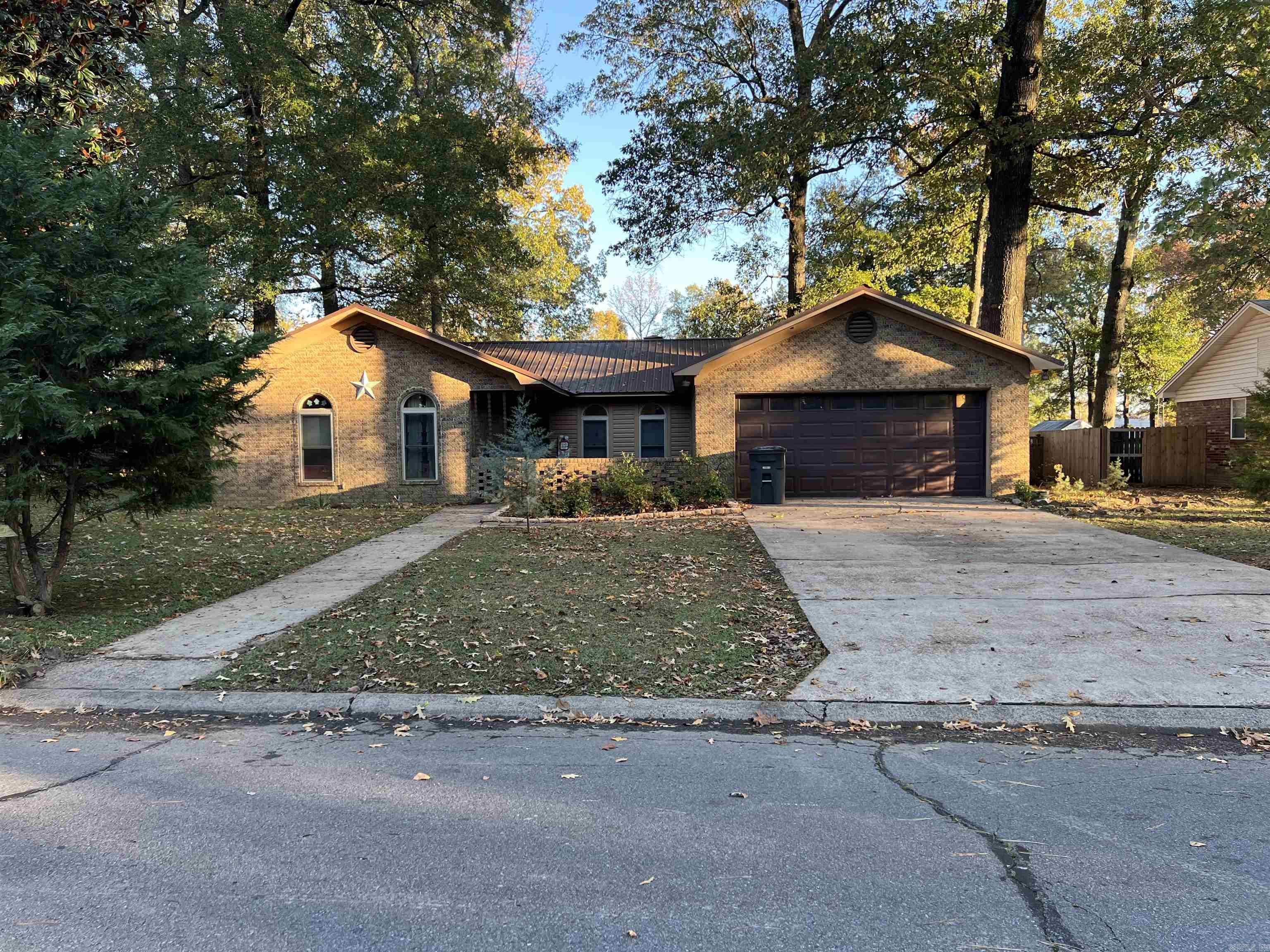 You will love all the updates to this home located on a large lot! Home features 3 bedrooms, 2 baths, large remodeled living area with beautiful beamed ceiling, new luxury vinyl flooring and fireplace. Kitchen has been updated, new floors, cabinetry, countertops, farm sink, amazing wood ceiling and stainless steel appliances. Large master suite with updates including shower and vessel sinks. Two guest bedrooms, one presently used as an office. Large fenced yard with nice shop/storage area with 220. HVAC replaced 2016, water heater 2022, roof replaced 2014. Don't miss out on this great home, call today. SEE AGENT REMARKS.