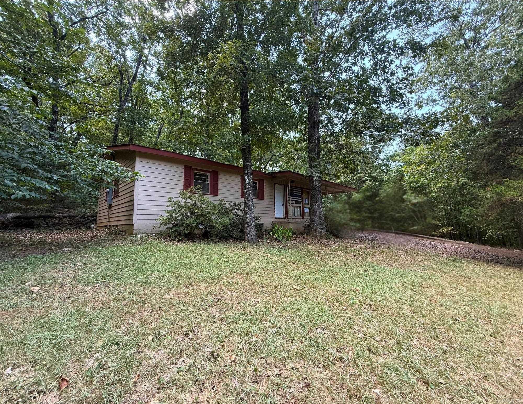 3 Bedroom Home in Cherokee Village, Close to the Lake! This 3-bedroom, 1-bath home is ready for new life and a fresh start. It offers a carport, partially fenced yard, and a convenient location near the lake. The home does need repairs and updating, but with some work it has the potential to become a comfortable residence, vacation getaway, or investment property.