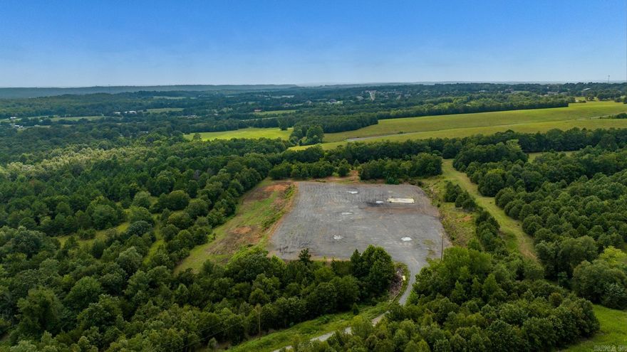 Looking for land for a home or business. This property had a gas well at one time that is no longer there. However the road is in great shape and you have endless possibilities with the gravel pad that is left. You can save a huge amount of money since the dirt work has all been done for you and is covered completely with gravel. There is also a nice area at the very back where you could build a house. It is very private. You can't see any houses around you. Power and water at the back of the property. Water meter at the road.