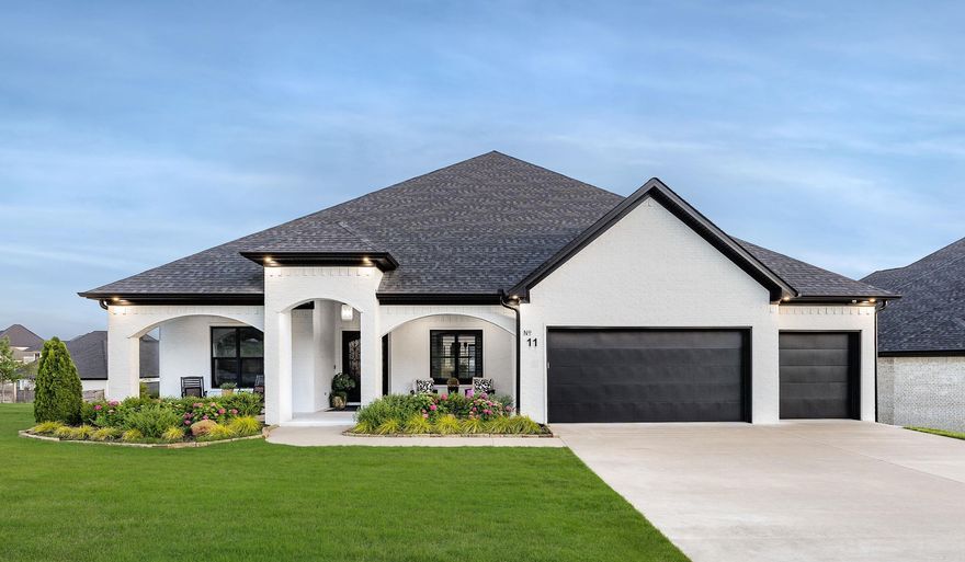 Stunning Modern Transitional Home in Falstone! Built in 2022, this single-level gem offers 3,392 sq ft of thoughtfully designed luxury on a prime corner lot. A grand 14-ft foyer sets the tone, leading into an open floor plan with soaring 10- and 12-ft ceilings that create an airy, inviting atmosphere. This home features 4 spacious bedrooms and 3 full bathrooms, blending functionality with modern elegance. The oversized kitchen island and walk-in pantry are perfect for entertaining and everyday living. Step outside to enjoy the large front porch or unwind on the covered back patio, complete with a wood-burning fireplace and built-in gas grill—ideal for year-round gatherings. Bonus attic space provides ample storage or future potential. Located in the highly desirable Falstone community, this rare find won’t last long. Schedule your private showing today and experience the best of single-level luxury living.