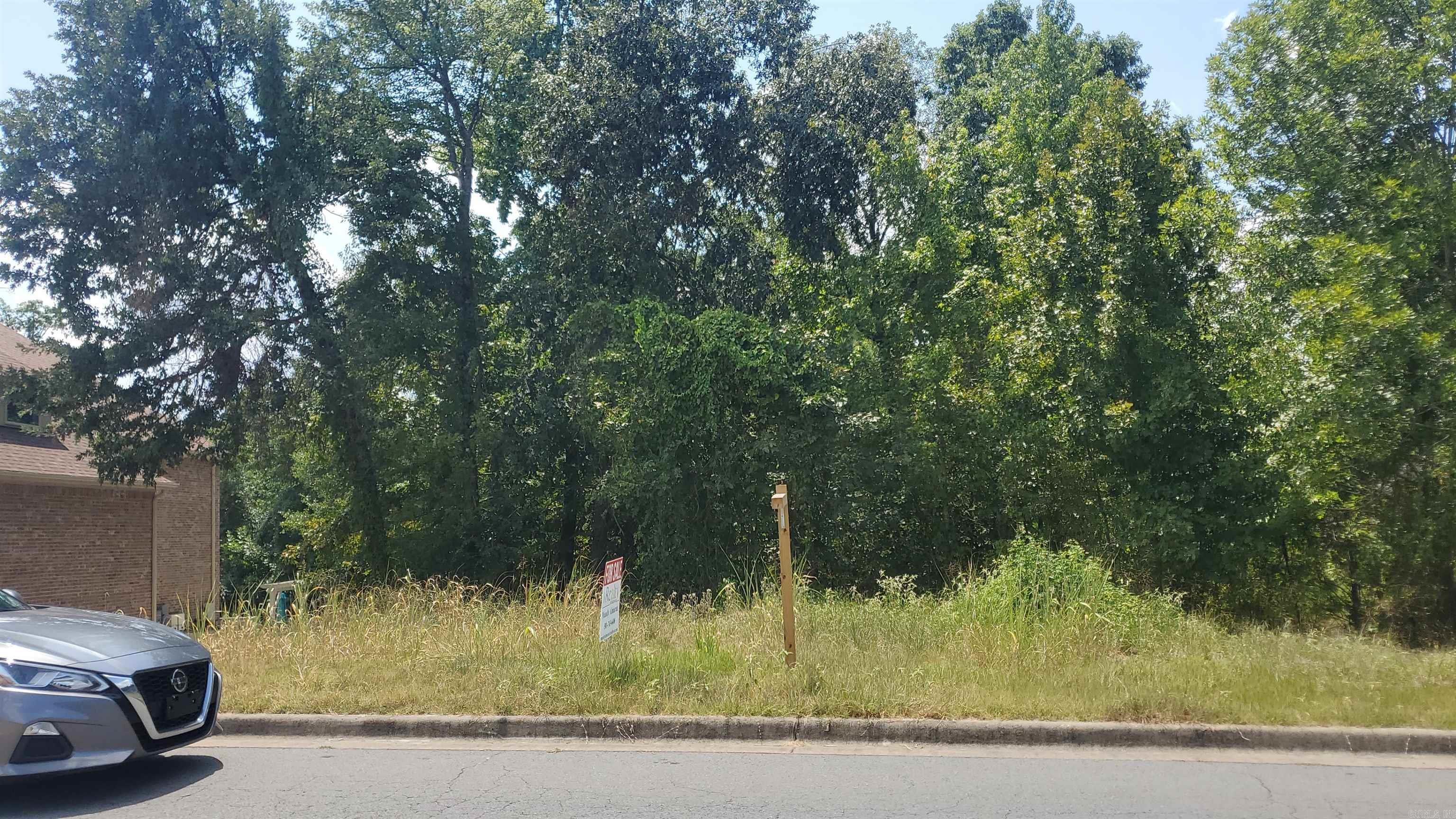 Discover the Perfect Canvas for Your Dream Home Welcome to Oneida Way in the beautiful Osage Terrace subdivision—a quiet, established neighborhood tucked in the heart of Maumelle. This spacious vacant lot offers a rare opportunity to build your custom home in one of the city’s most sought-after communities. Surrounded by mature trees, well-maintained homes, and a sense of peace and privacy, this property provides the ideal blend of neighborhood charm and natural beauty. With convenient access to local parks, walking trails, schools, shopping, and dining, you'll enjoy the perfect balance of tranquility and convenience. Whether you're looking to build your forever home or invest in a growing area, this lot is full of potential and ready for your vision to come to life. Don’t miss your chance to make your mark in Maumelle—schedule a visit today and imagine the possibilities