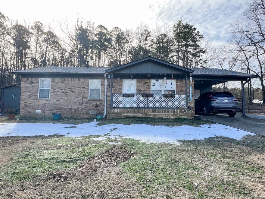 This beautiful home hosts 3 bedrooms, 1 bathroom, and sits on 1.2 acres. Some recent upgrades include and a new roof (2024), an A/C unit (2020), and solar panels that were installed in 2021 and have been paid off. Additionally, a He-Shed sits adjacent to the home to store all of your lawn-care tools and supplies. Finally, make coming/leaving home a breeze utilizing the covered carport and the drive-through driveway. Schedule your showing today because this house won't last long!