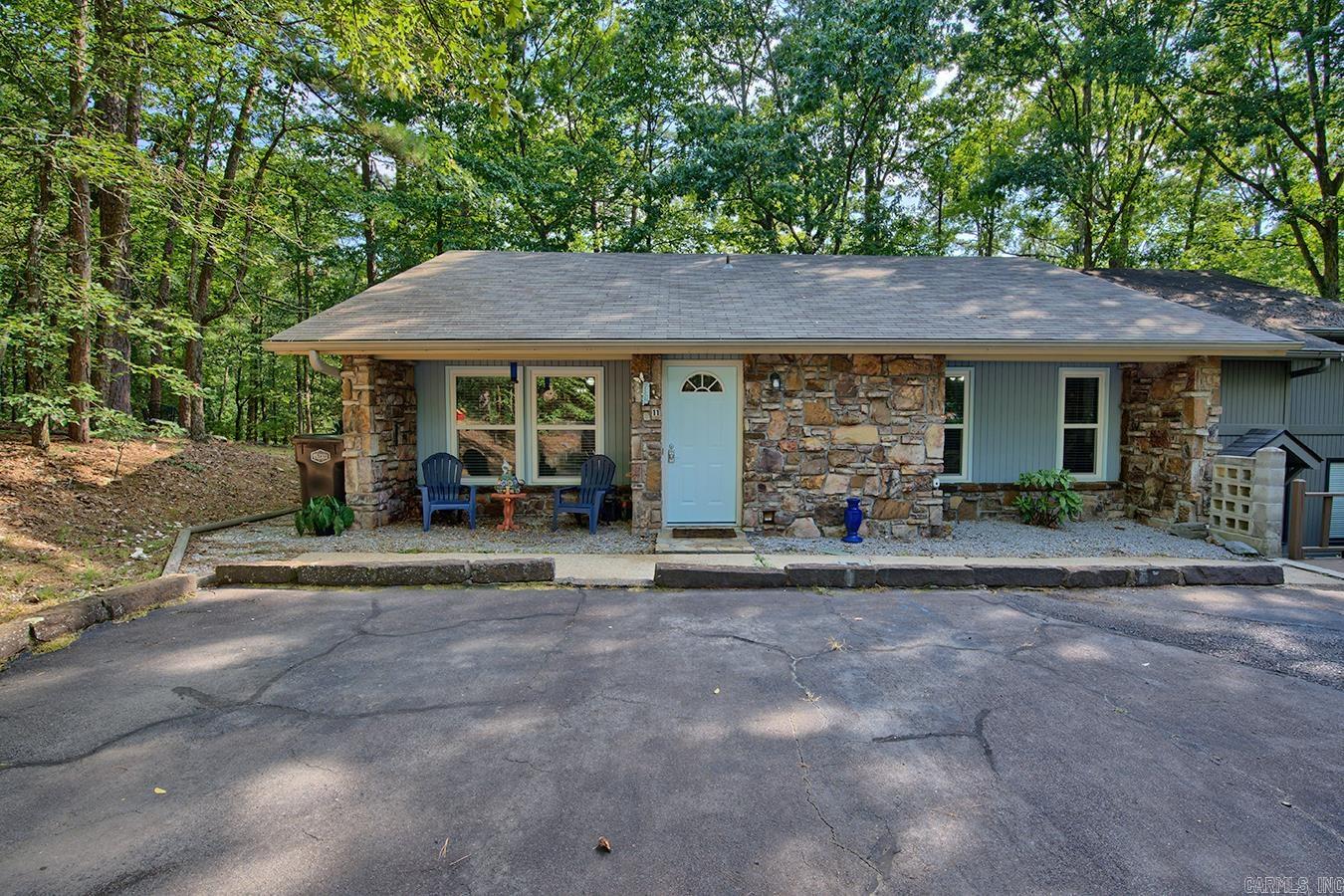 This is the one!!! Impeccably updated and in a great location within walking distance to many amenities including beautiful Lake DeSoto with marina, fishing pier, and cafe. Features include 3 bedrooms, 2 bathrooms, stainless steel appliances, new countertops, fresh paint, new flooring, peaceful sunroom, extra storage space/ workshop below, and a relaxing deck overlooking a wooded backyard. Royal Windows installed in 2023 & extra attic insulation lower electric bills considerably! Situated on the corner of Vaqueria Lane surrounded by trees and adjacent to common property, this charming townhome is very unique and tranquil. Selling "mostly furnished" and currently rented by reliable tenants, this is a tremendous turnkey investment opportunity. Whether purchasing for your private residence, family getaway, or investment, you will not be disappointed!