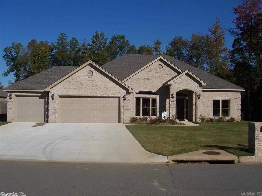 Custom built 4 BR, 2 Ba, 3 car garage, covered patio, gated community w/clubhouse, pool, lake & tennis courts.  Great for an active family.  Beautiful interior with up to date finishes.