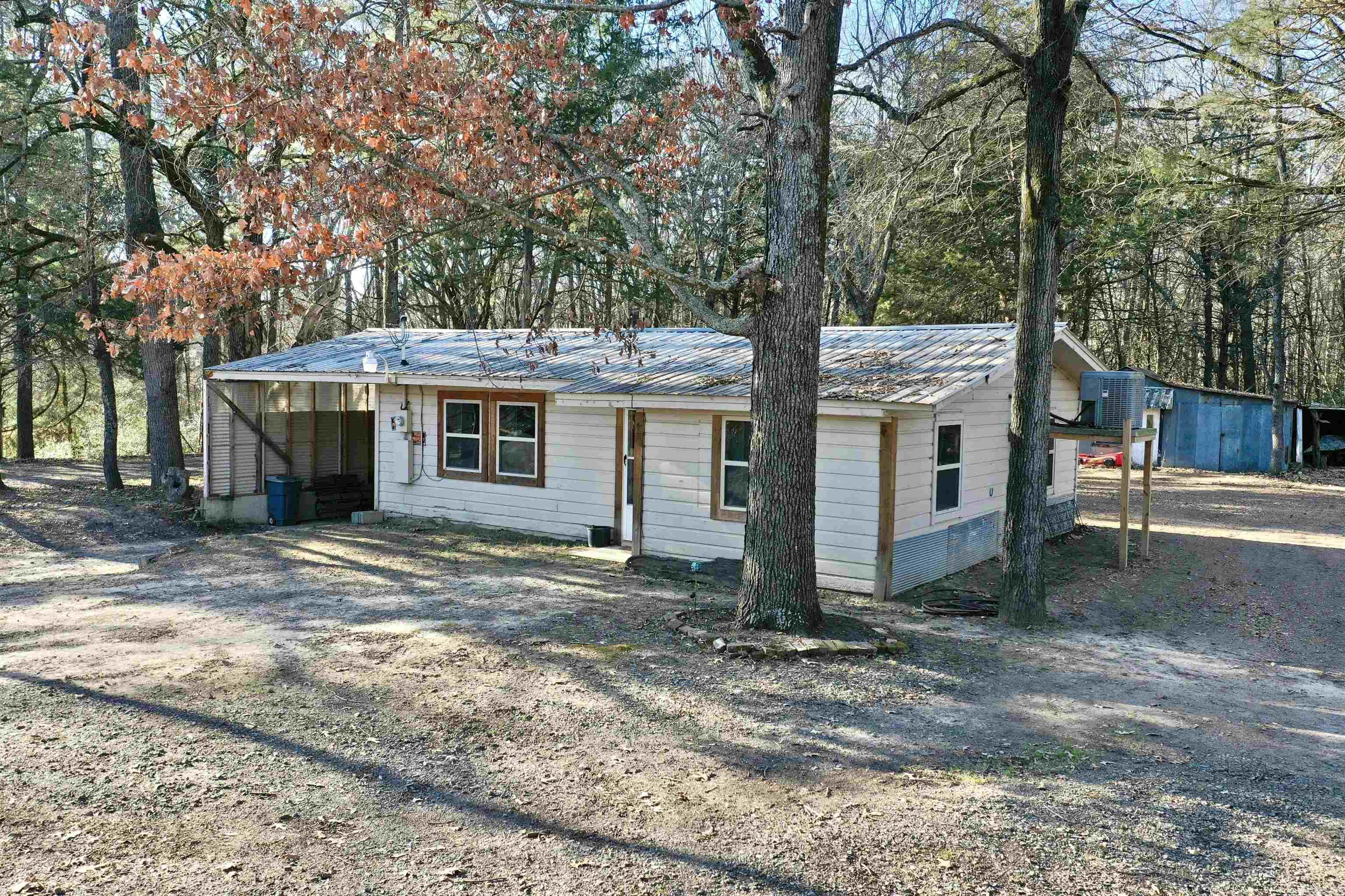 Riverfront at West Point Access on the Little Red River! This adorable and newly renovated 2 bed, 1 bath home sits on 3.85 acres with riverfront access. West Point borders the Bald Knob and Hurricane Lake Refuge, this property is also just up the river from Steve Wilson Refuge in Georgetown. Walk out dock floats when the water is high enough, boat ramp is steps away. This property offers an RV hookup, storage shed, storm shelter and 1 car carport. Roof and HVAC is less than 2 years old, tankless water heater - 5 yrs, all new electrical and plumbing 3-4 yrs. Stylish cabin finished with pine tongue and groove, galvanized tin with a country lodge style atmosphere.