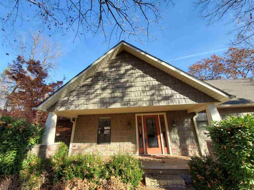 Low White Line, Lake Front-Lake View Home that boasts 3 bedroom and 3 and 1/2 baths! Real Wood floors throughout, Tile floors in bathrooms, Granite counter tops flow throughout the home! Custom Cabinets, stainless appliances, gas cook stove & built in oven in this custom kitchen.  Expansive decks stand overlooking Greers Ferry Lake. Stone Steps guide the way to the extra large deck down at the shore line next to the white line. Plenty of room for lake toys storage. Lot next door is for sale MLS #