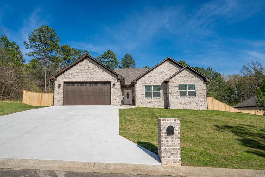 BRAND NEW CONSTRUCTION!!  This home is absolutely stunning!! Top of the line cabinets! Two tones for a one of a kind kitchen of your own with cabinets galore and a nice size pantry!  Quartz countertops!!! Beautiful transparent subway tile backsplash and gorgeous upper cabinets that go to the ceiling and transit glass doors at the top with lighting!!! Black electric surface range, Stainless appliances , dishwasher, refrigerator,  microwave wall oven with a huge breakfast bar large enough for the family to eat at, with designer pendant lighting! Dinning area has a beautiful dinning table light and bay window! Living room area has beautiful gray floors luxury laminate, also a very nice electric remote fireplace! And huge ceiling fan.  The bathrooms have Porcelain tile walk-in showers with rain water shower heads! The master bedroom has a slipper tub and a walk-in shower!  A huge master bedroom to fit all your large bedroom furniture. Each bedroom has their own bathroom and Walkin closet. The bedrooms have blinds on the windows. There is also a powder room off the front room for guest. Very nice lighting and plumbing fixtures throughout this home!  A private fenced and patio back yard