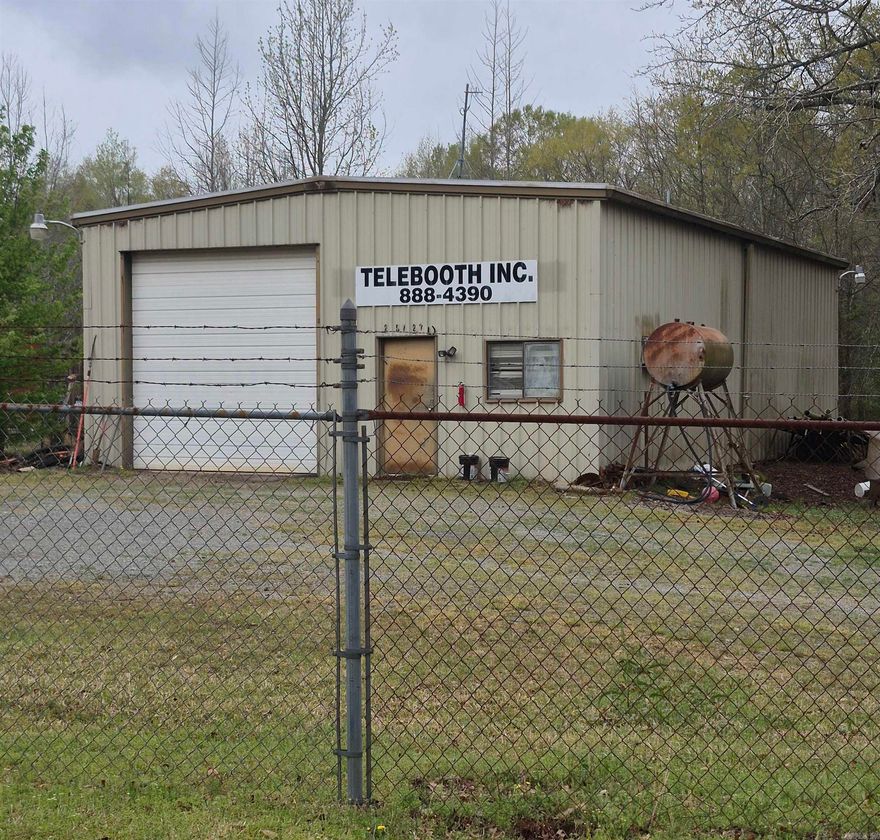 Come view this awesome property located in the East End Community for a commercial opportunity. Perfect spot for a auto repair shop or a commercial business. Property fully fenced in with a 30x50 shop, two offices and a high ceiling bay. Plenty of space for parking and storage. Property located with highway frontage on Hwy 167. Also a 2 sided billboard will convey with property which is owned/leased by local bank.