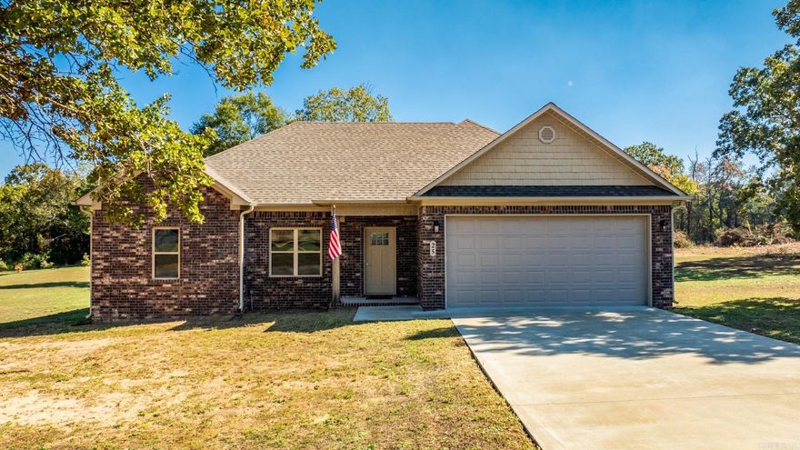 Built in 2022 on over an acre in Greenbrier School District. This home features an open floor plan with granite countertops and vinyl plank flooring throughout.  Upgraded with gutters and an extended concrete patio, this home is move-in ready and priced to sell.