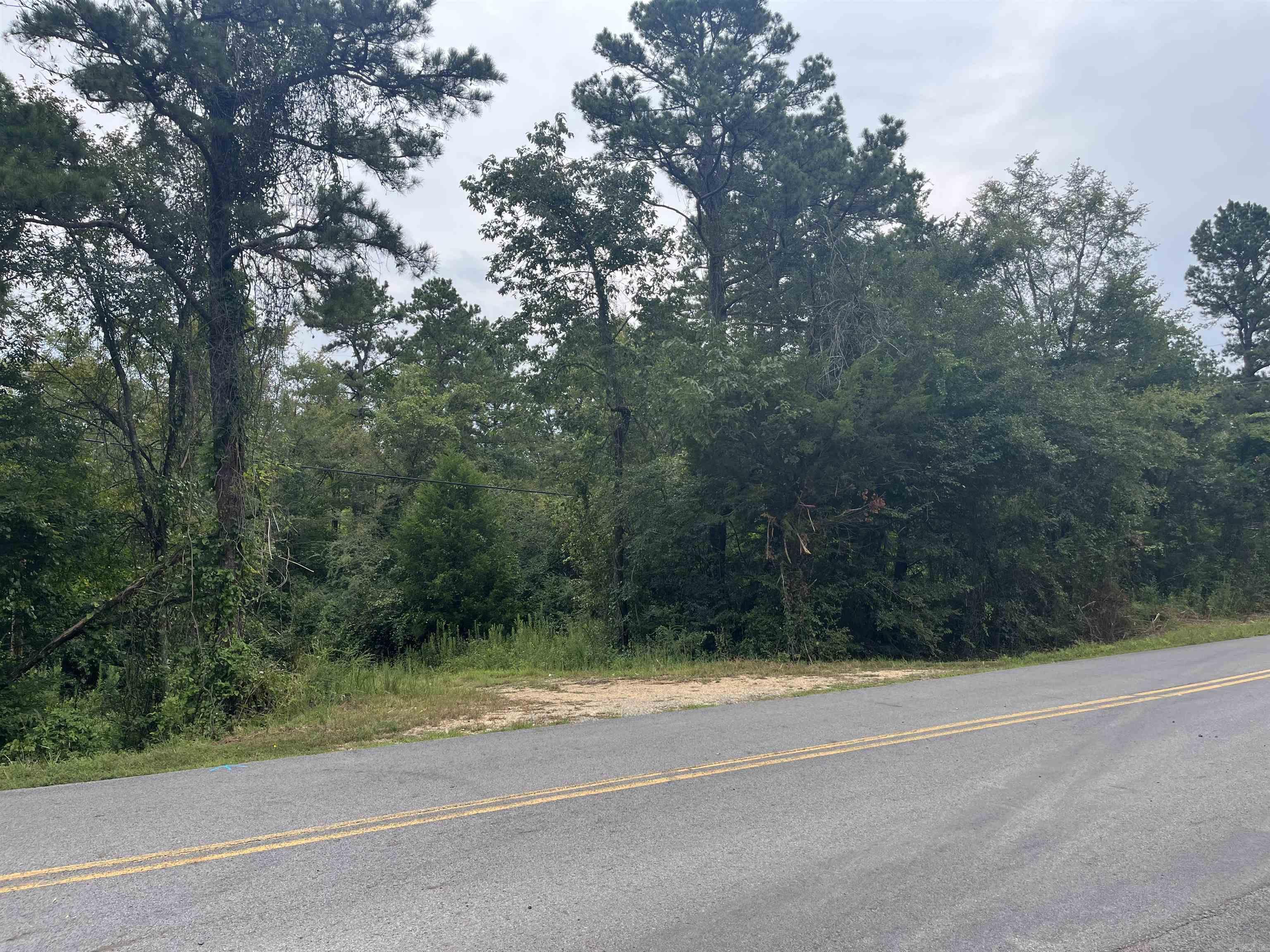 44 Liberty Road offers approximately 7 acres in the Caddo Hills School District! This property features a new driveway, a seasonal creek, and access to city water. Located less than 20 minutes from Glenwood and just 5 minutes from the Caddo River, it provides a great opportunity for building or investment with convenient access to local amenities and outdoor recreation.