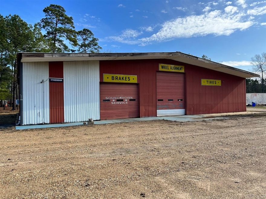 This large metal building on busy 4 lane, state hwy 79, offers great visibility, high traffic flow and endless possibilities.  The shop has an overhead fan and a large standing fan to keep cool. There is a wood burning heater and a large gas heater to keep the shop warm.  The property could be used as an oil changing pit, alignment or radiator shop, etc.  Call Ramona Crain or any Century 21 Campbell & Company agent at 870-837-2121 or 870-818-1595.        Square footage, year built, and lot size taken from courthouse records.