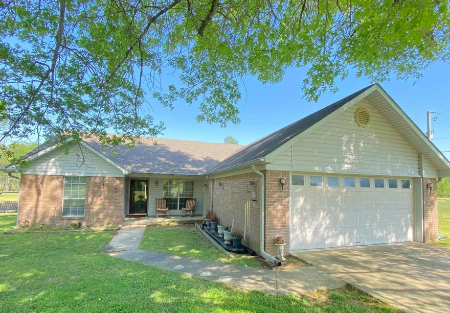 This charming 3 Br 2 Ba is nestled in a quiet, spacious neighborhood.  This home is sitting on 3.11 acres of level ground.  Lots of room for a garden, adding a pool, and just enjoying room to spread out.  The home itself is a split floor plan with an ample kitchen and eat in dining area. Off of the laundry room there is a bonus space that has been used as a beauty shop, but would make a great office area. If you are looking for an in town area with the feel of the country you will need to check this out soon.