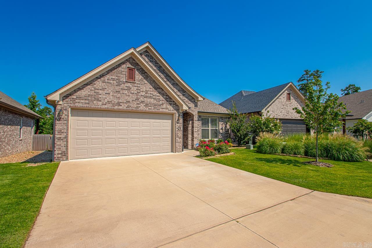 Welcome to your dream home in the prestigious Parkside Addition of West Little Rock. This stunning 3 bedroom, 2 bath home is waiting for you to make it your own. From the moment you step inside you will be captivated by the spacious open floor plan that seamlessly flows from living room to the kitchen and dining area. As you arrive, you will be greeted by charming curb appeal. Expansive living area with gas log fireplace. Kitchen is a chef's delight featuring a gas range, granite counters, stainless steel appliances and pantry. Spacious dining area for entertaining. Large primary suite apart with spa like bath with soaking tub, separate shower, double vanity and walk-in closet. 2 Additional bedrooms with shared bath. Step outside to your covered patio that backs up to a dedicated green space. Enjoy a low maintenance lifestyle with lawn care provided by Homeowners Association. This home offers easy access to top-rated schools, shopping, and restaurants. Don't miss out on this incredible opportunity to own your dream home. Schedule your showing today!