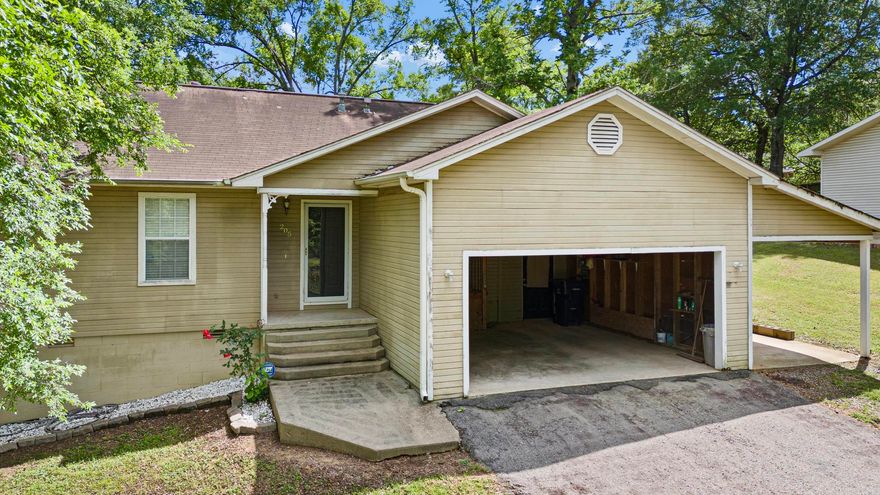 This cozy frame-construction home offers comfort and character in a peaceful setting. Nestled on a quiet street, it features lovely flooring throughout and a practical layout that's perfect for easy living. Step outside to a well-maintained yard with plenty of space to relax or garden. A small shop on the property provides extra storage or a great workspace. Conveniently located with an easy commute to both Russellville and Conway. Furnishings could convey with an acceptable offer—just bring your personal touch and make it home!