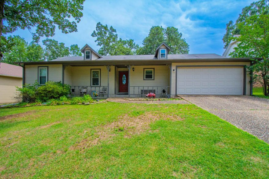 Updated and so cute! You will LOVE this home with fenced in large backyard, huge covered patio, great for cook-outs and family gatherings! This family friendly home features a living room with beautiful fireplace and mantle, open to dining and kitchen with breakfast bar and tons of cabinets, awesome gas range, refrigerator stays! No carpet!! Hall bathroom is updated too and so pretty! Workroom in garage! Great location, close to restaurants, shopping, city swimming pool, etc! Also has tankless water heater!! Make your appointment today! *Agents please read agent remarks