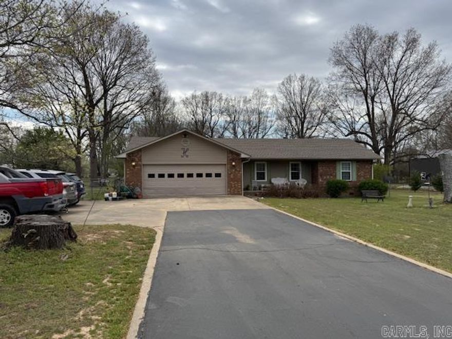 This 2016 square foot home has lots of important updates such as new 30 year architectural shingle roof in 2021, new TRANE HVAC in May 2025, new windows and custom blinds in 2020, new Bath Fitter walk in shower in November 2022 and new water heater in August of 2024. The 3 bedroom and 2 bathroom home has a master suite with private bath and walk in closet. There is a kitchen/dining combo, a laundry room/office and 3 separate living areas including a gorgeous sunroom! Other features include hardwood floors, current termite contract with Hyde’s, backup gas wall heater, 324 square foot covered deck off two of the living area, 528 square foot two car garage with two storage rooms and wheelchair ramp. Clay County Electric, Summit Gas, LCRW at the home and Clay County Fiber Optic Internet available. The 1.67 acres m/l are nice and level and have a chain link fenced area and a paved driveway. Just 3 miles to Pocahontas city limits. Close to hospital and Dr offices! *Home requires 24 hour notice to view.