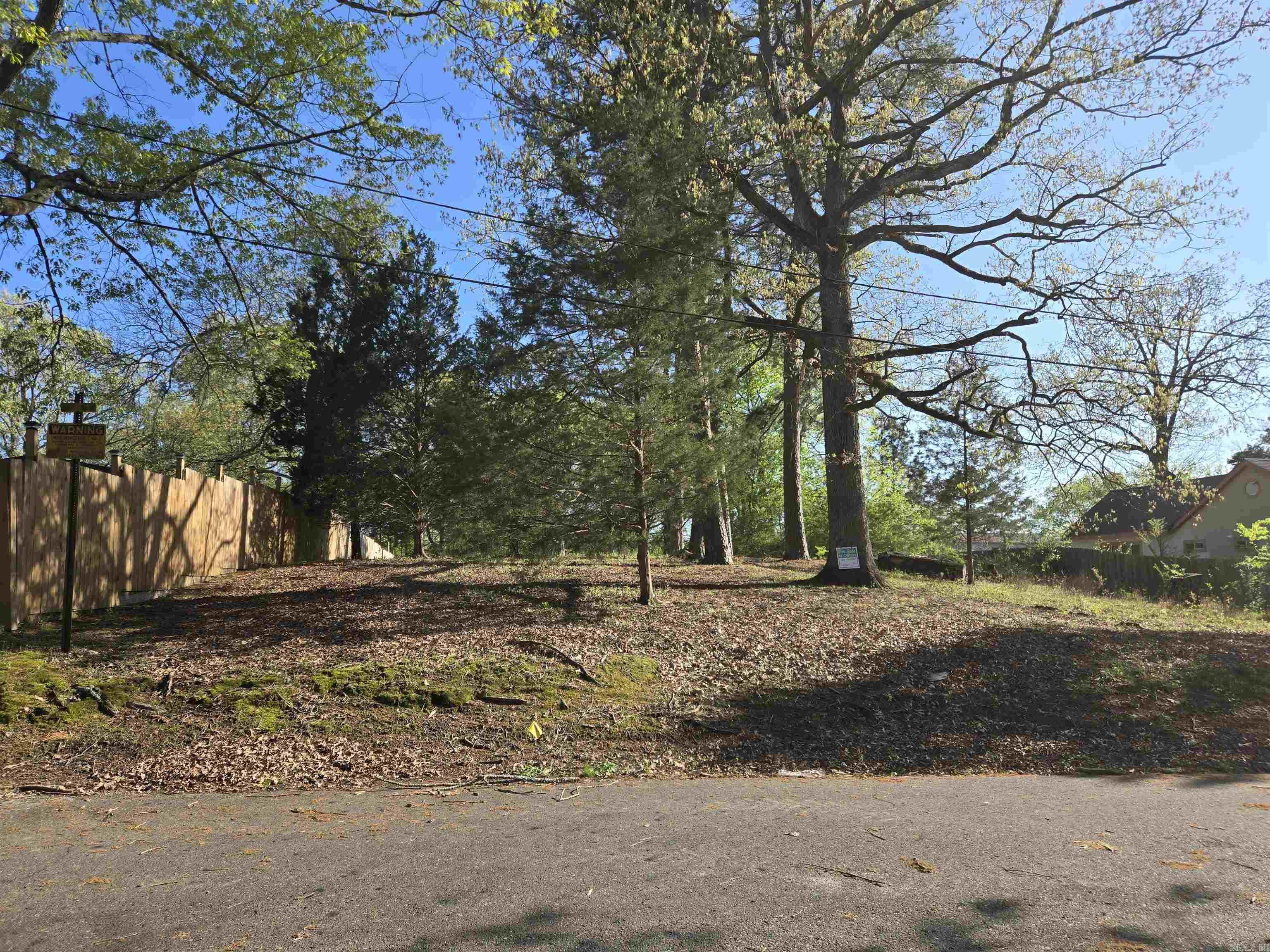 Discover the perfect opportunity in Hot Springs with this beautiful .28-acre lot, ideally located just minutes from Oaklawn Racing Casino Resort and nestled next to Hollywood Park and Trail. With direct access to a scenic city trail, this property is a dream for outdoor lovers and those seeking peace and convenience. Whether you're envisioning a permanent residence, a weekend getaway, or a peaceful retreat, this lot offers endless potential in a serene, well-connected setting. Close to all the shopping, dining, and entertainment Hot Springs has to offer. Donāt miss your chance to own a slice of Hot Springs.