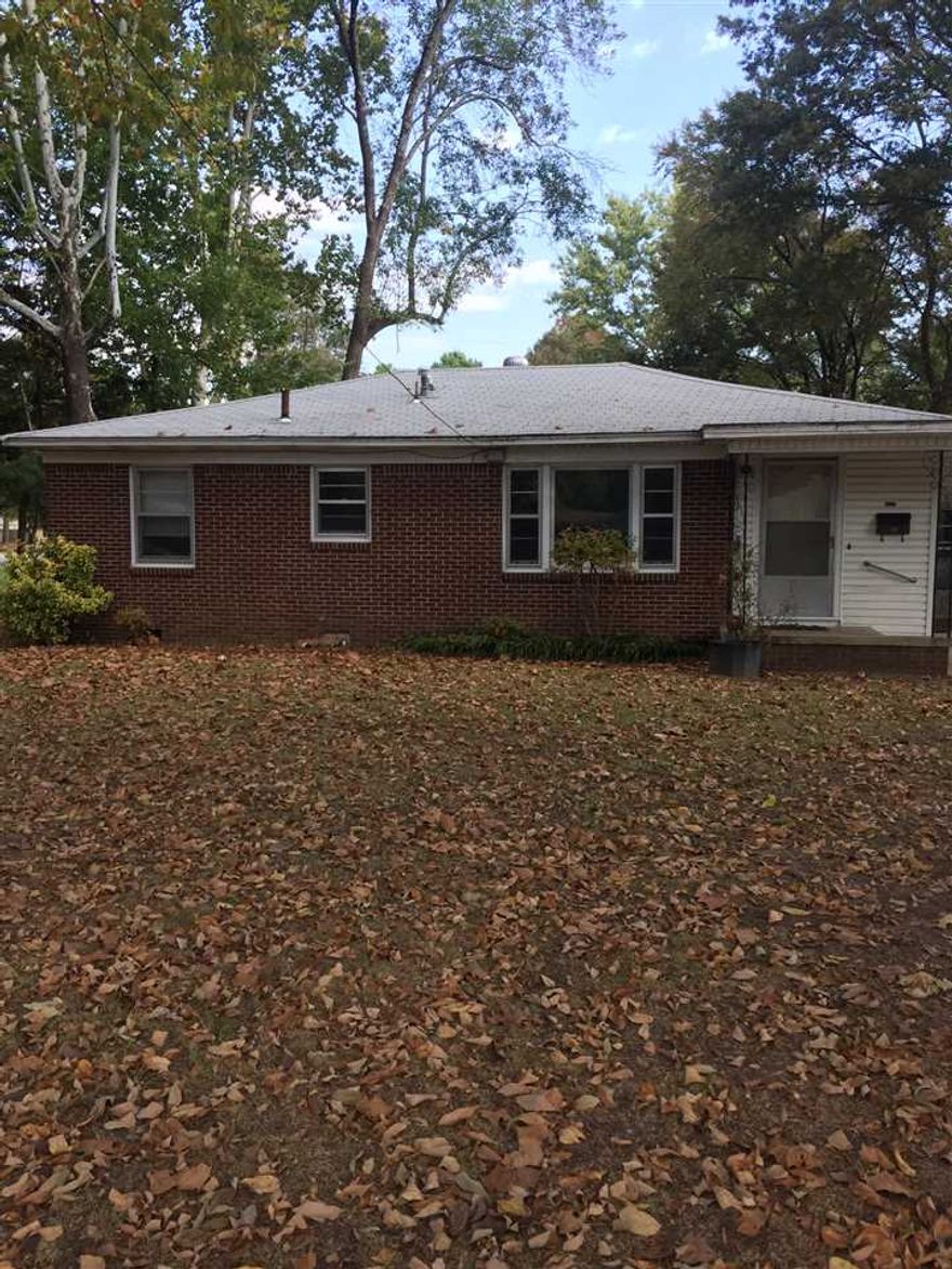 3 Bed/1 Bath sits on 2 1/2 lots close to schools