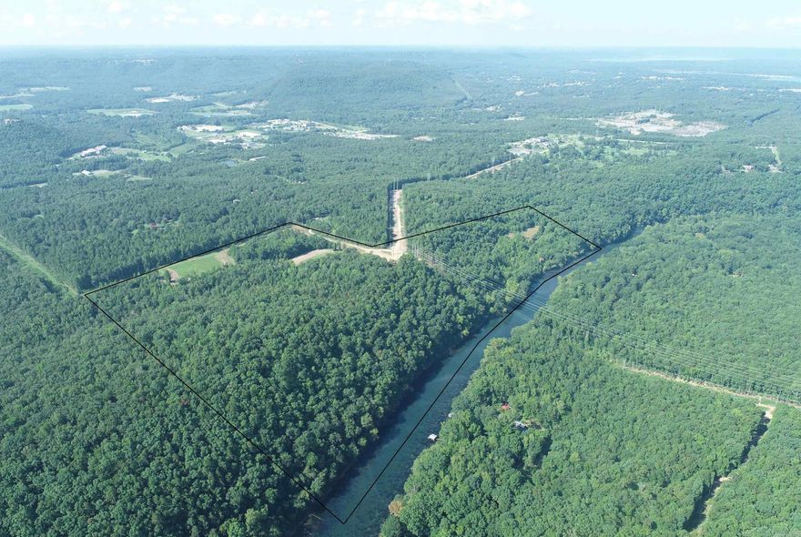 75 unrestricted acres containing 2748.21 Ft River Frontage located on the Trophy Fishing Waters of the Little Red River.   Excellent riverfront development or Private Estate.  Located near Baptist Hospital,Arkansas State University Campus and the By-Pass. Riverbank and upper level with pasture and woods. Excellent hunting and abundant wildlife. Deeded easement road to the river frontage. Survey in Associated Documents.  This is your opportunity to create your own private world of fishing, hunting, and enjoying family and friends away from all of life's hustle and bustle.