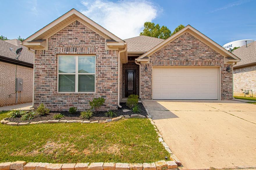 Updated Patio Home in Gated Community! This well-maintained home features an in-ground sports pool, all-seasons sunroom, sprinkler system, and open floor plan with tall ceilings. Interior highlights include wood floors, granite countertops, stainless steel appliances, crown molding, arched doorways, and spray foam insulation. Barn doors add charm to the master bath and laundry. Carpet and luxury vinyl in living, dining, and kitchen can be removed to reveal hardwood floors underneath. Includes a safe room for added security.