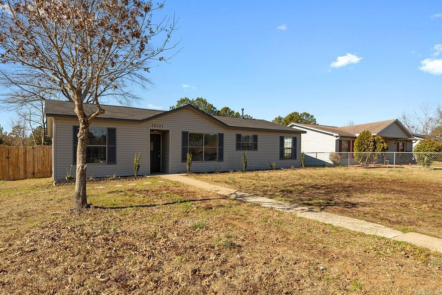 This stunning, fully renovated 3 bedroom, 2 bath corner lot home offers the look and feel of new construction with timeless, high end design throughout. From the new Roof to the all new LVP flooring, fresh paint, new fixtures, and all new appliances, every detail has been thoughtfully updated. The kitchen features custom cabinetry, granite countertops, and a versatile bonus space ideal for a breakfast nook or private office. Both bathrooms have been completely redesigned with custom cabinets and elegant finishes. The split bedroom layout provides privacy and functionality, while the living room impresses with vaulted ceilings and a gas fireplace. A detached two car garage offers ample parking and storage. Schedule your private showing today and experience this beautiful home for yourself.