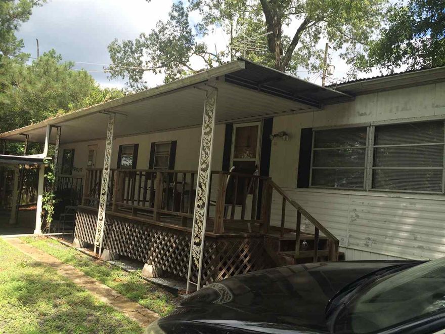 Cute little home in a great area with a very nice lake view. 2 BR 1 BA, outside storage, covered parking, and an awesome lake view!! Lot rental of $270.00 per month includes water.