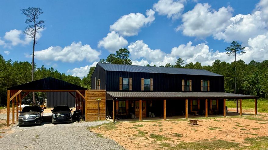 Custom-built 6 bed, 3.5 bath, 3,600 sq ft home on 40 flat, picturesque acres just minutes from Benton. Thoughtfully designed & built by the builder for the builder—no corners cut, just quality craftsmanship & a smart, livable layout. Approx. 5 acres cleared with a gravel circle drive & 2-car carport, perfect for welcoming guests or hosting family. Electric utilities ran underground & a 400-amp service—plenty of power for future additions or shops. Fridge, plus a top-of-the-line washer/dryer set (valued at $10K), all convey. This isn’t your typical laundry setup—two all-in-one washer/dryer combos let you wash & dry two loads at the same time with zero hassle. A built-in laundry chute from the upstairs bath drops directly above the downstairs washer, making everyday tasks easier than ever. A 30x60 storage building sits just behind the home & matches the exterior, offering ideal space for storage, hobbies, or expansion. The land is peaceful, private, & full of wildlife—deer are frequent visitors. Whether you’re looking for a forever home or a family retreat, this property offers comfort, space, & freedom in a fast-growing area. Rarely does a home this special come along!AGENTS SEE REM