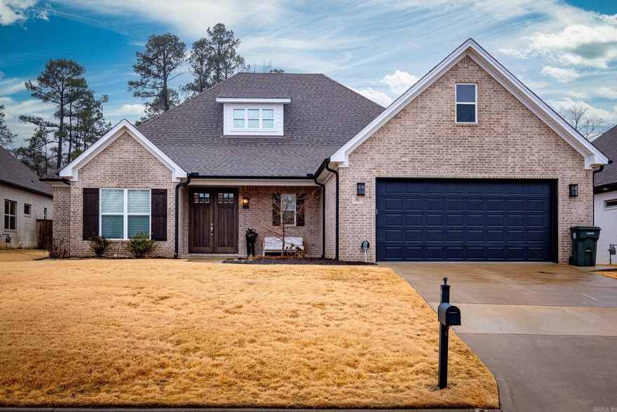 Gorgeous and functional 5BR/4 FULL BATH home in Chenal Valley featuring 4 BR downstairs and a 5th BR/Bath upstairs. Inside, this home stands out with gorgeous hardwood floors, coffered ceilings and fireplace in the great room, custom cabinets in the Chef's kitchen, and a large, freshly painted kitchen island with breakfast bar. The Split BR plan highlights a massive primary suite and walk-in closet that flows into the spacious laundry room. Outside, you can enjoy sitting on your front porch or entertaining in the level, fully-fenced backyard under the covered, screened-in patio w/fireplace. This home is an entertainer's dream! Recent updates include new carpet, paint, and light fixtures downstairs, new toilets in all 4 bathrooms, and new RPZ for sprinkler system. Come see! *See Agent Remarks*