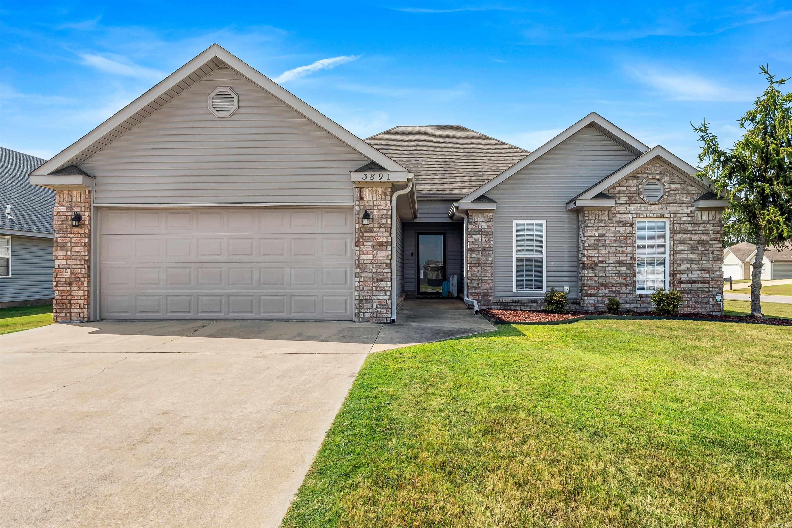 Welcome to 3891 Bridlewood! This 3-bedroom, 2-bath home is more than just a house it's the backdrop for your next chapter. Step inside and feel the warmth of 1,671 sq ft designed with both comfort and style in mind. The cozy kitchen, outfitted with stainless steel appliances, is ready for everything from Sunday pancakes to late-night snacks. Acid-stained concrete floors lend a sleek, timeless feel that's both beautiful and easy to maintain. Perfect for kids and your furry, four legged friends! Picture cozy evenings gathered in your open living space, or step out back to your own private retreat. The fenced yard and covered porch invite endless memories whether it's summer cookouts, quiet mornings with coffee, or watching kids and pets play while you relax under the shade. Perched on a spacious corner lot, this home offers room to dream big, create a lush garden, build a fire pit, or simply soak in the serenity. It's the kind of space that makes life feel a little lighter, a little sweeter. Don't just imagine it, come experience it. 3891 Bridlewood is waiting to welcome you home!