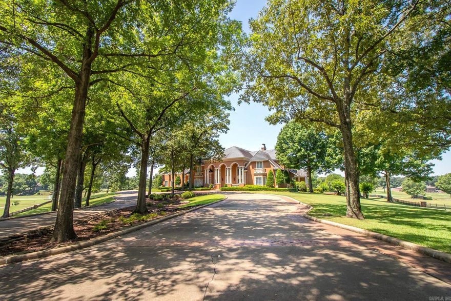 One of Arkansas' most distinguished estate homes  is waiting, just for you.  This palatial estate offers panoramic views of the beautifully landscaped grounds from nearly every room.    An architectural masterpiece from beginning to end, this elegant floorplan is specifically designed with spaces suitable for large group entertaining as well as cozy family time.